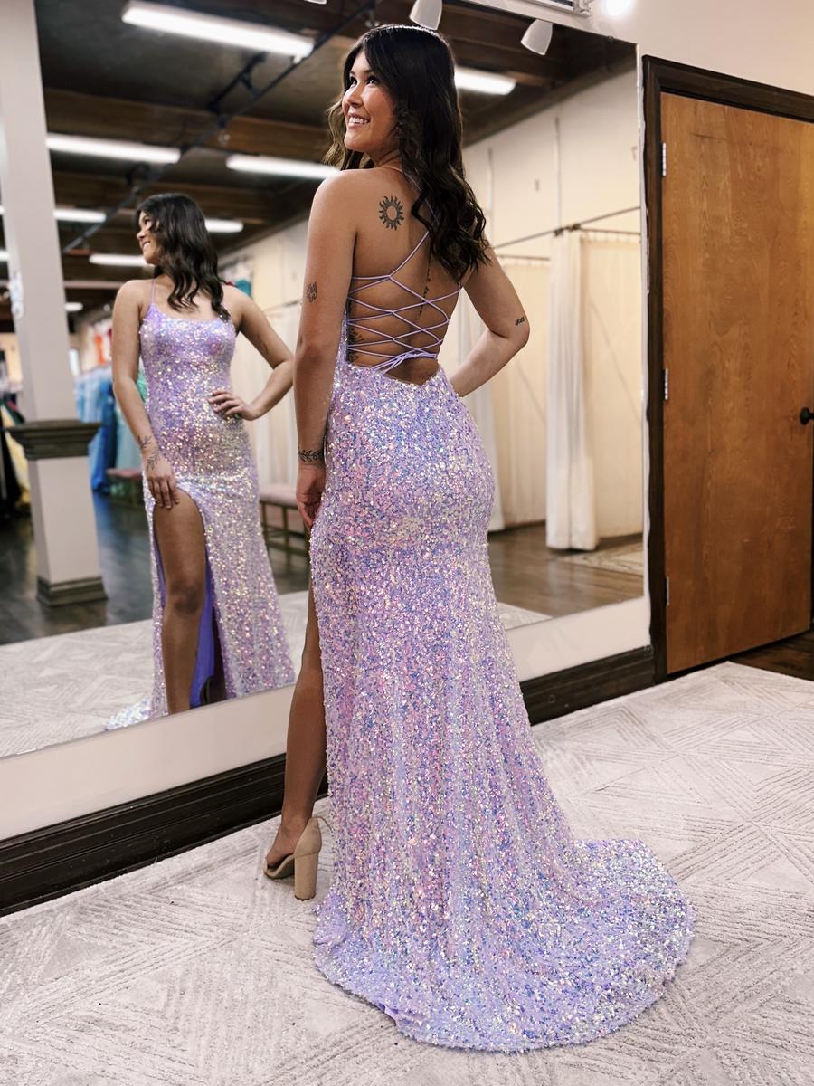 Prom dress dress features an all iridescent sequined body with a fun strappy adjustable back detail